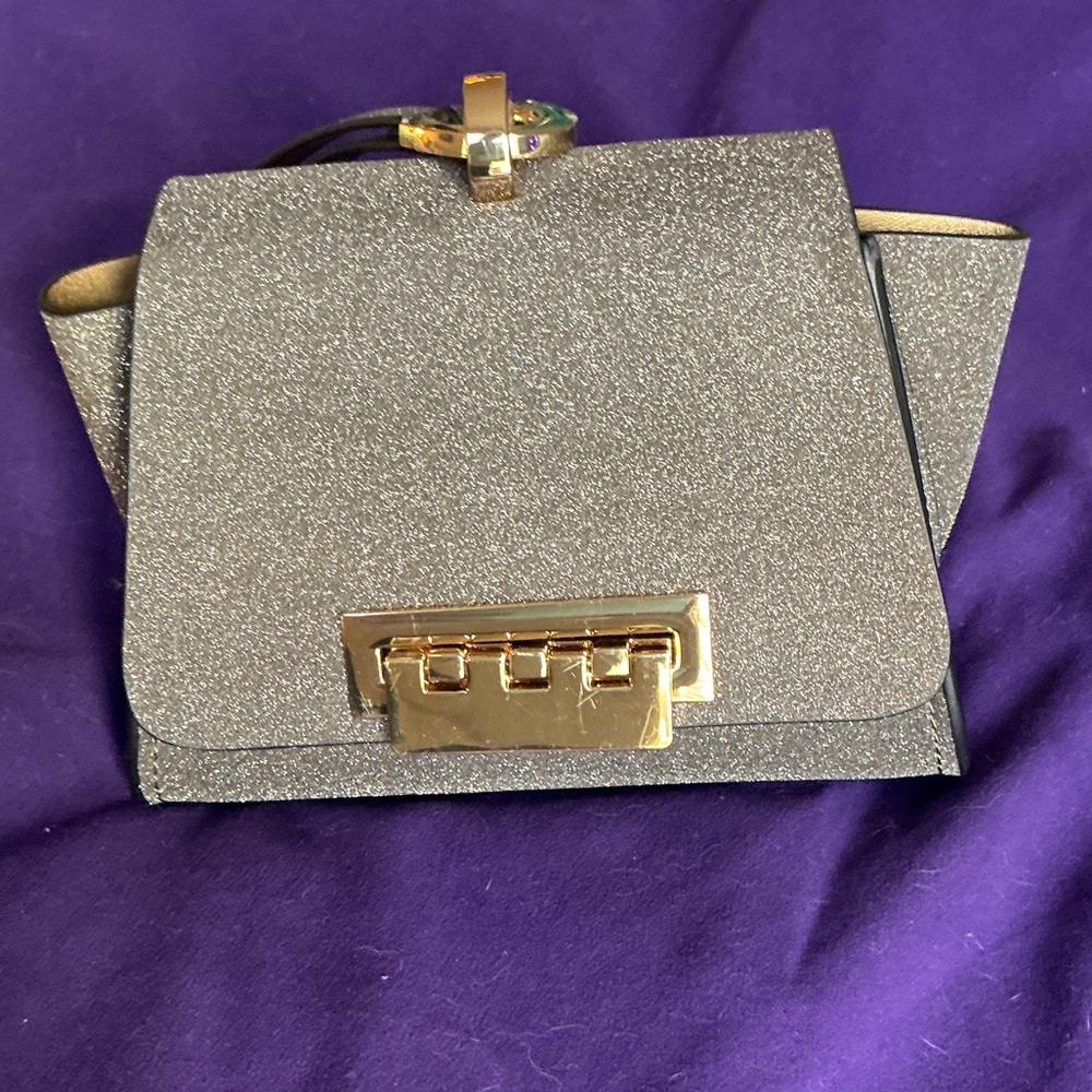 NEW - Beautiful gold sparkles, Zac Posen clutch. Never used.